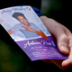Kyle Fogarty shows a memorial card after leaving the funeral for Antwon Rose II on June 25, 2018, in Swissvale, Pa.